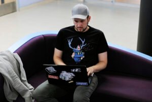 People working on computer laptop